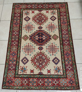 Tapis Kazak tissé main n°13899_174×118